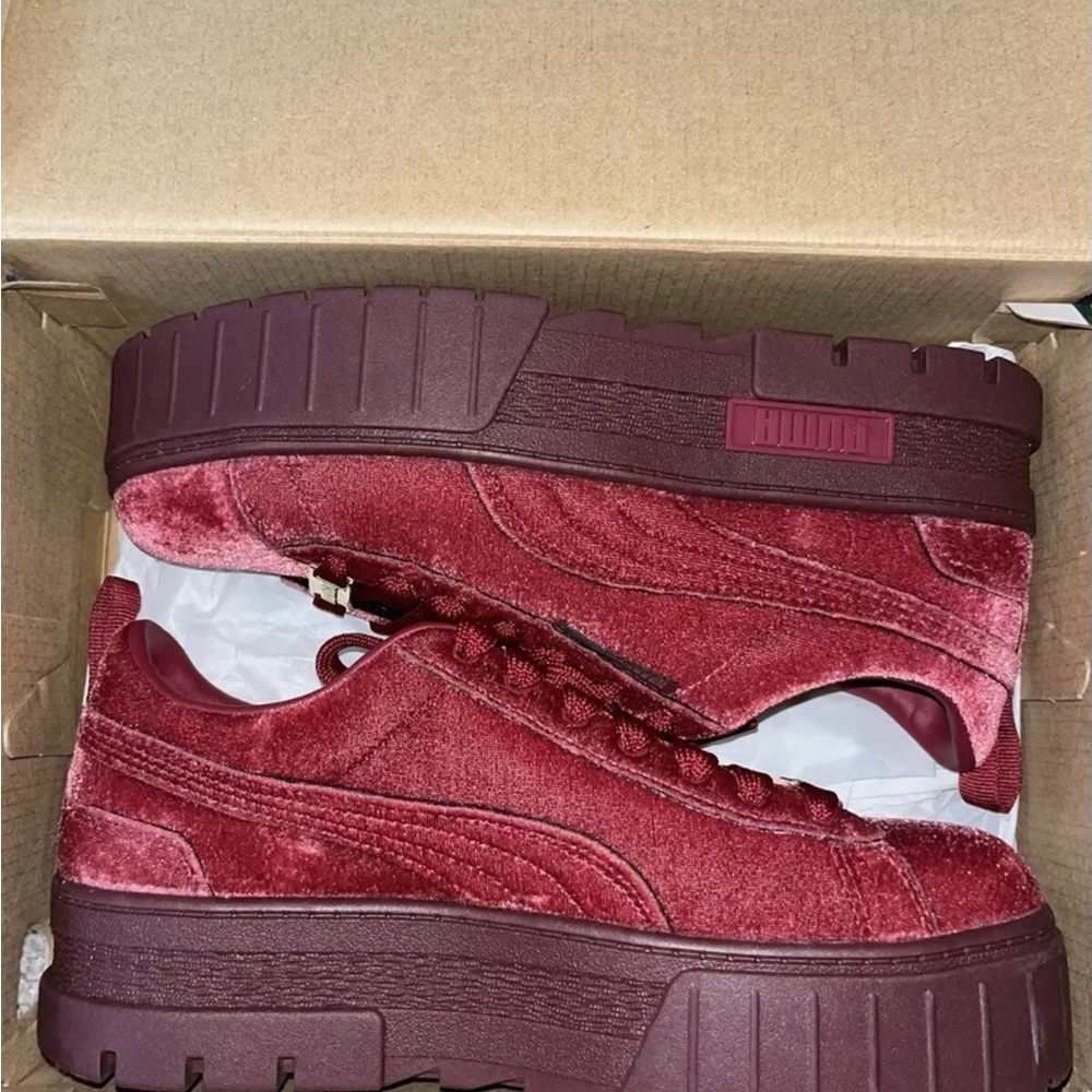 Burgundy pumas